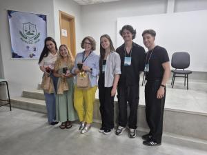 Palestra: Caminhos da Pós-Graduação. Palestrantes: Residente Nut. Elaine Ferreira, Mestranda Nut. Paola Turchiello e Doutoranda Nut. Mestra Camila Costa Gressler.